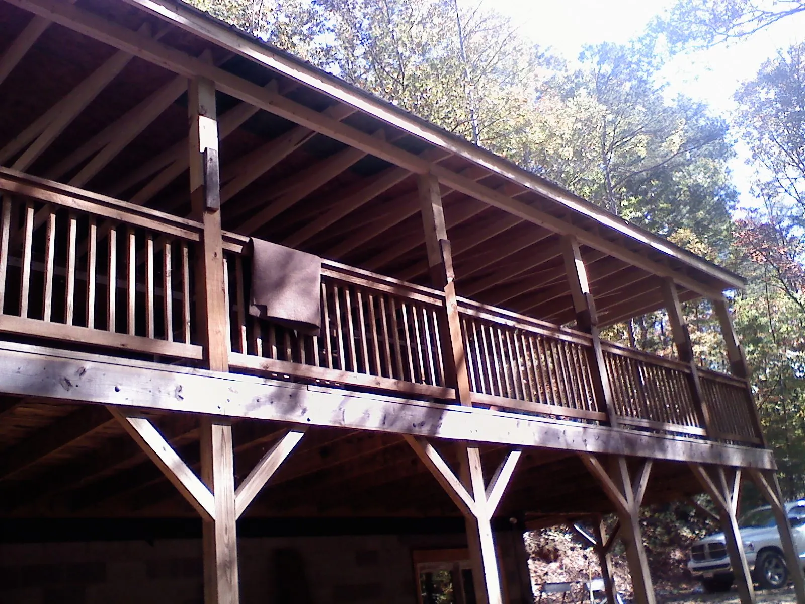 Timber framing under a new elevated porch and deck — Roof Leak Repair in North Lima by Roofing Brothers
